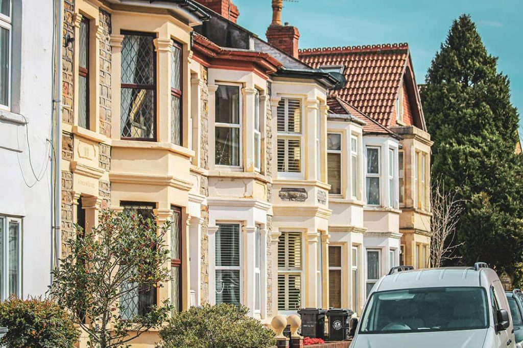 A row of Victorian houses with bay windows